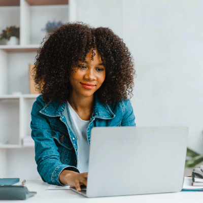 Stock image of a girl on a laptop