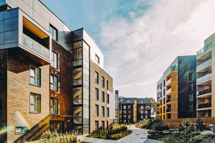 Complex of residential apartment buildings. What Does Renters Insurance Cover?