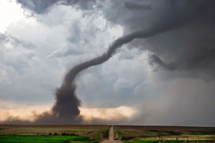 Tornado funnel and supercell storm cloud during a severe weather outbreak. What to Do Immediately After a Tornado in Kentucky?