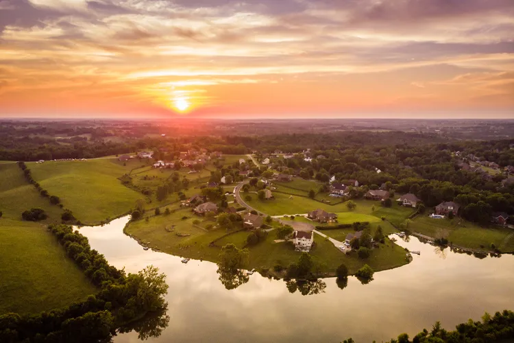 Aerial view of sunset over rural neighborhood in Central Kentucky. Where Is Flooding Most Common in Kentucky?