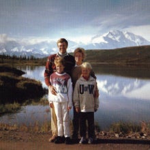 Charles Koch and his family in the mountains