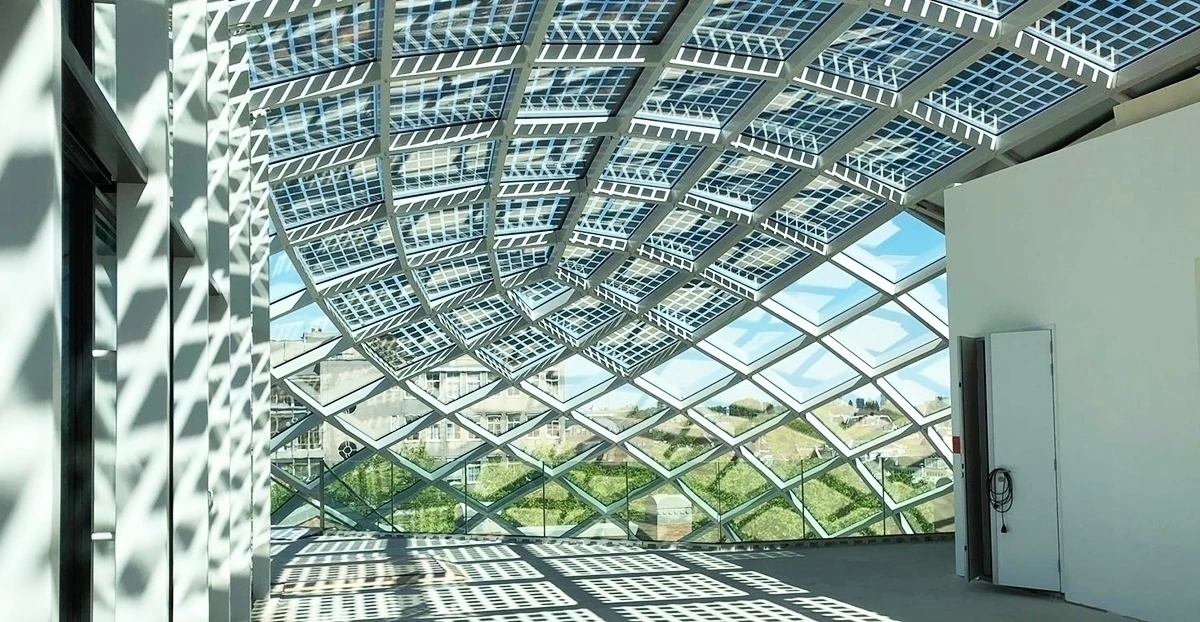 Capital C - glass roof topping structure
