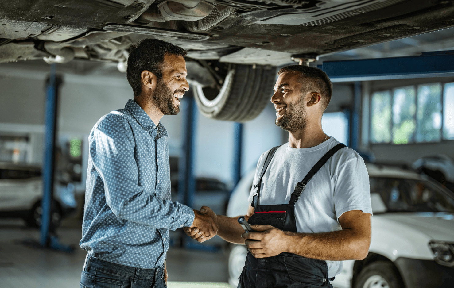 Customer and worker shaking hands