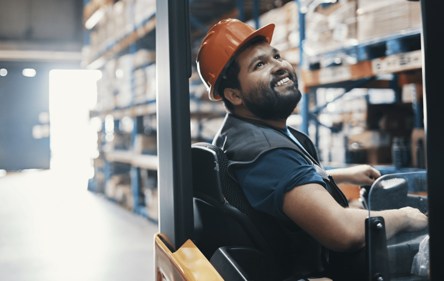 Worker on forklift