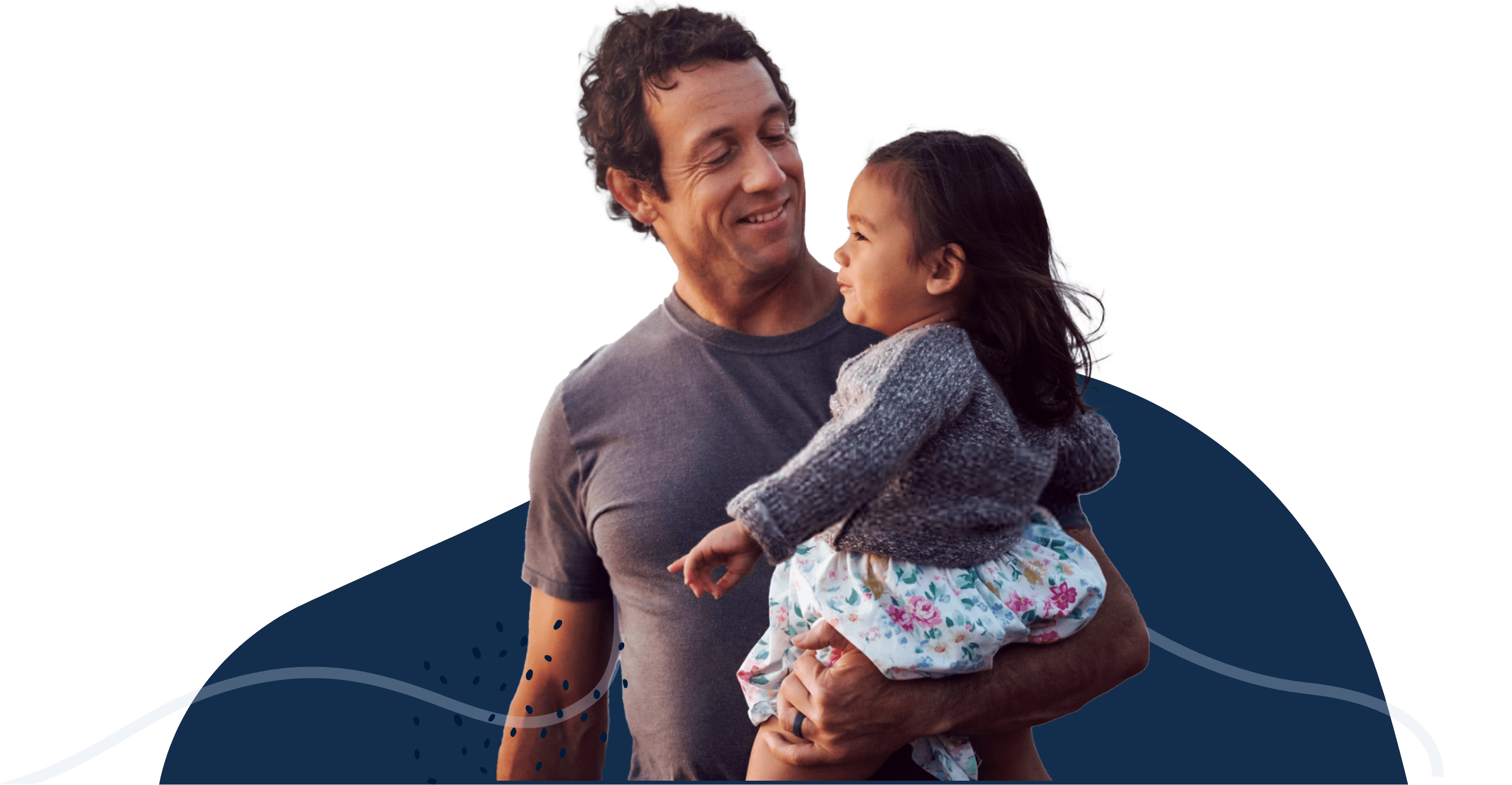 Father holding daughter