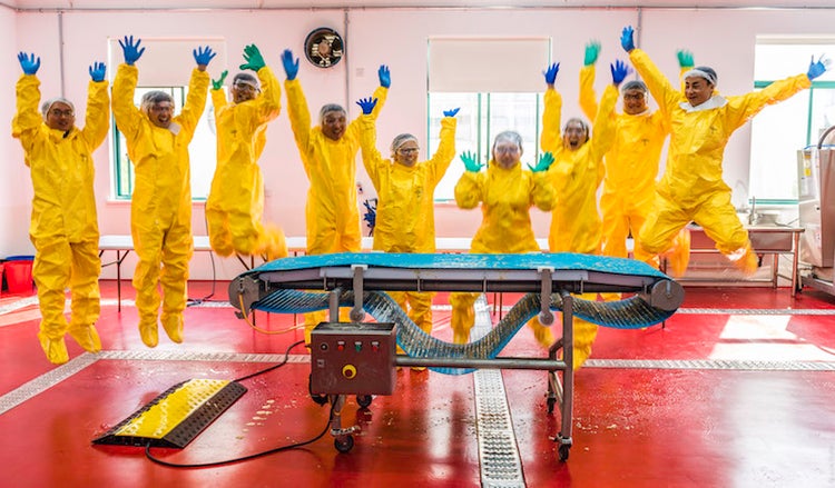 Jumping training participants in PPE at Sanitation Essentials Training