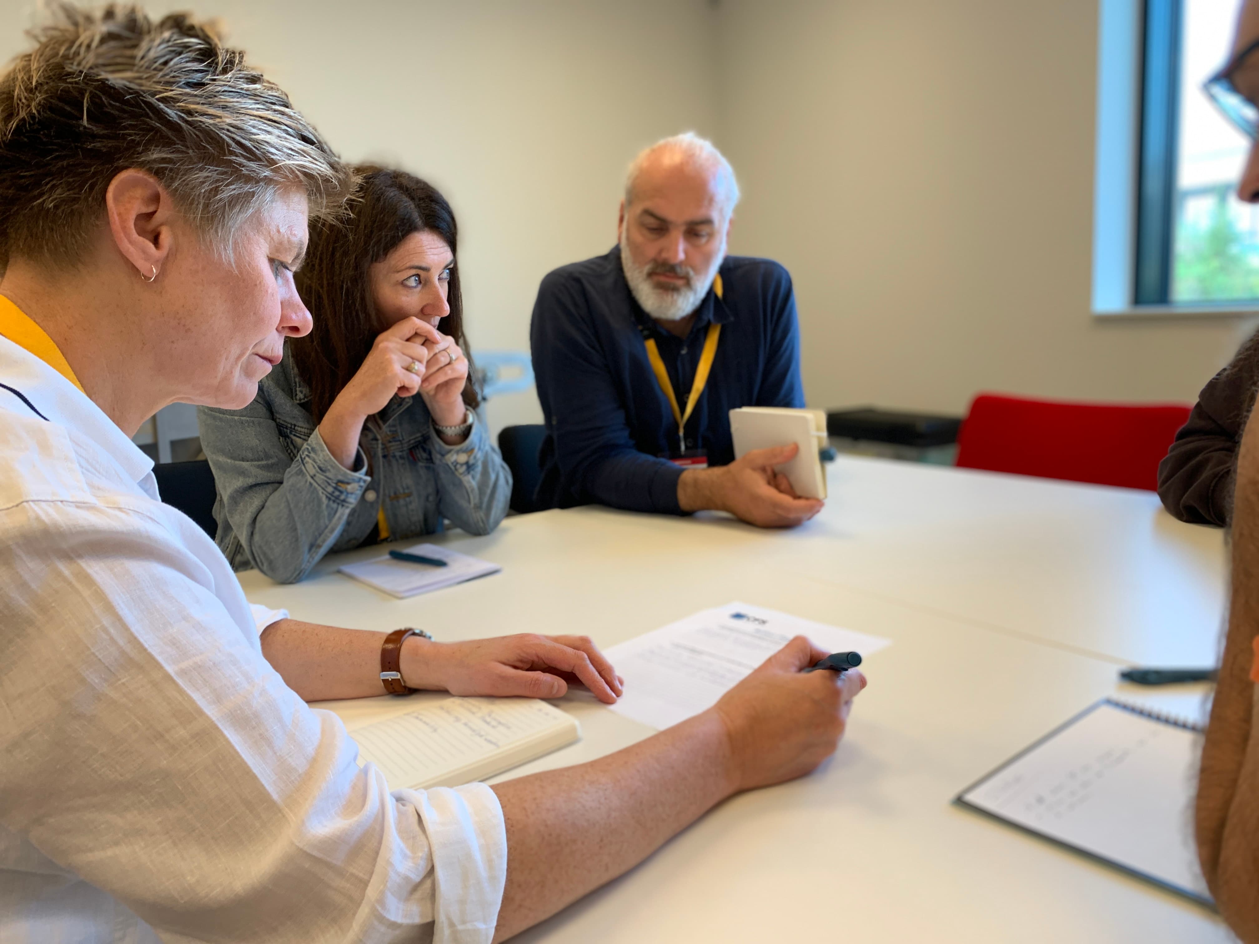 Chocolate Training participants collaborating on case simulation during breakout 