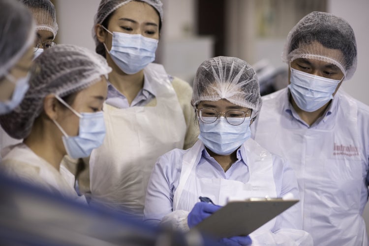Woman holding clipboard