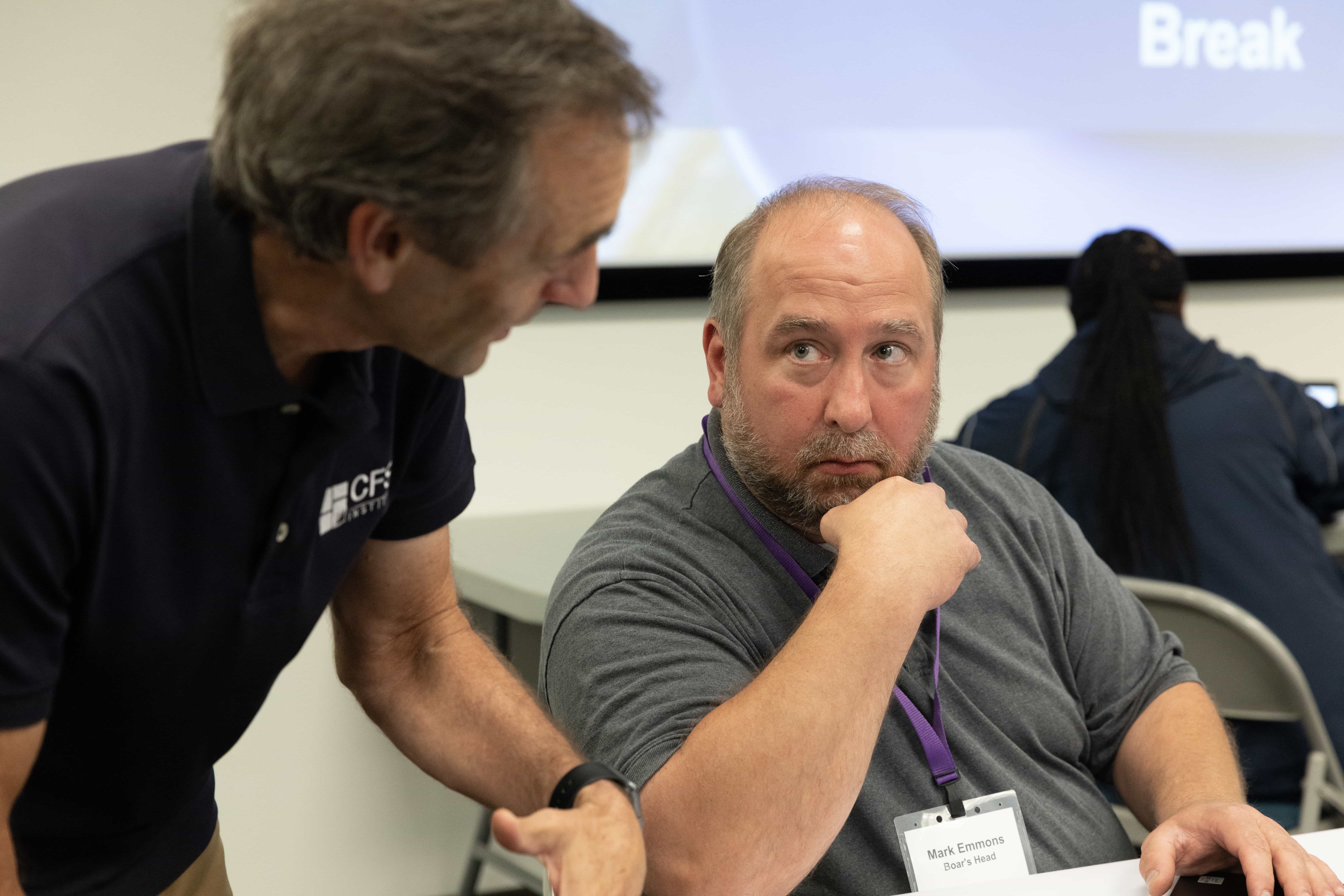 CFS Institute Trainer explaining something to a participant