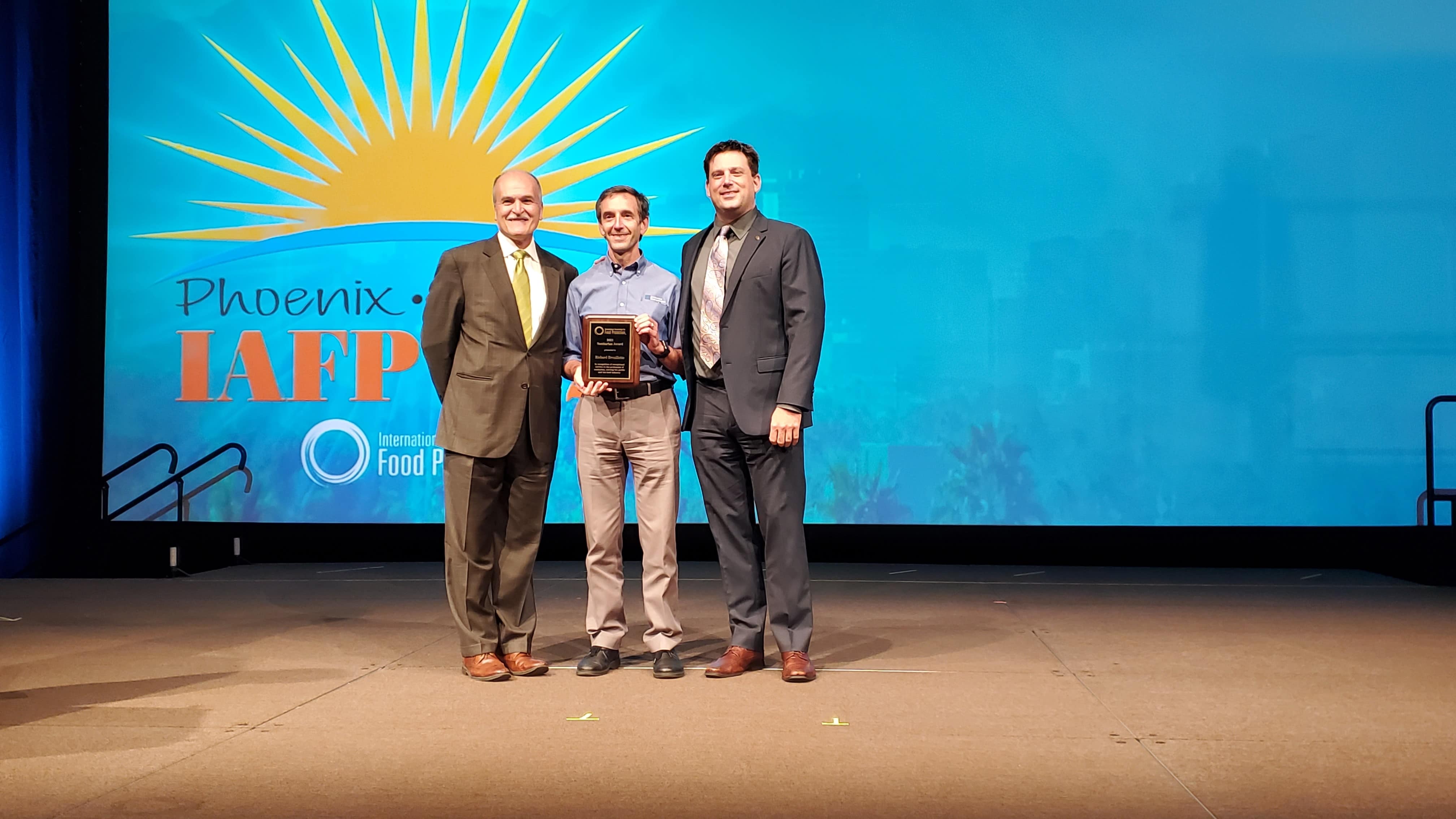 Richard Brouillette receiving award 