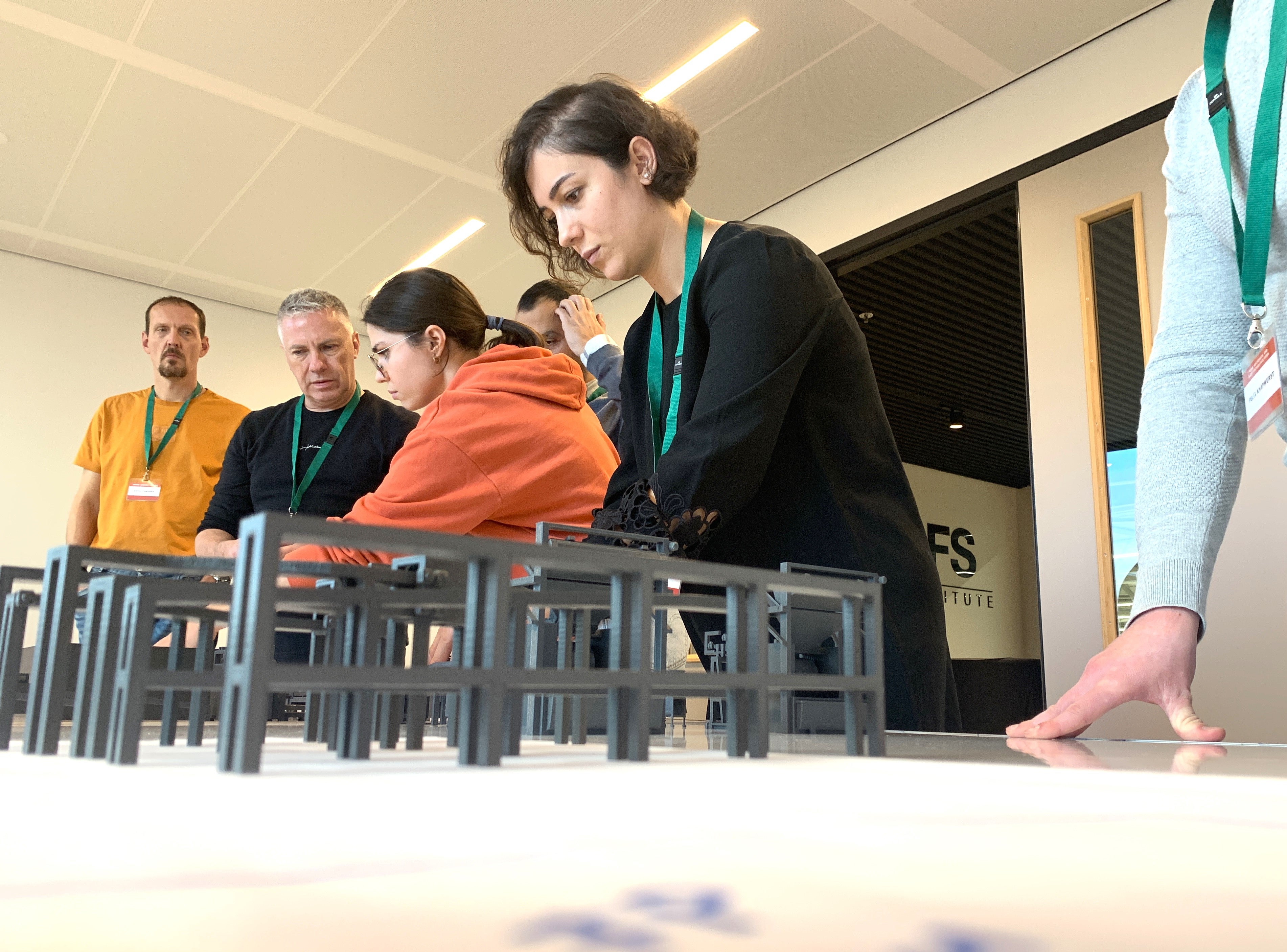 Participant group building their own food plant in HDT's Design-It-Yourself breakout