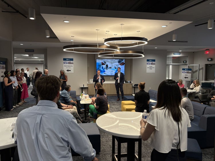 Darin Zehr and Killian Lapeyre thanking food industry professionals for attending the CFS Institute Open House aa part of IAFP2026