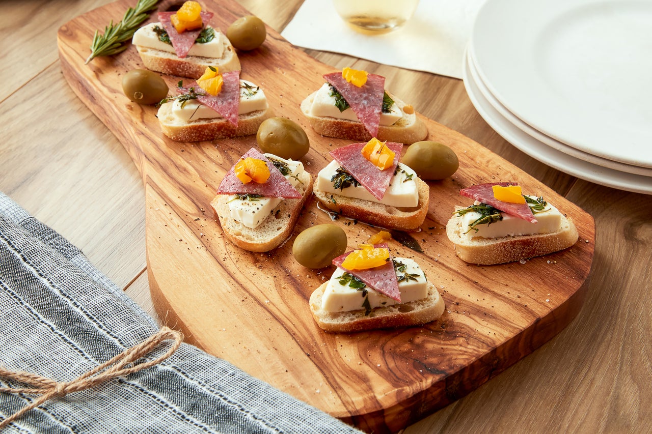 Salami Mozzarella Crostinis with Italian Herbs | Carando