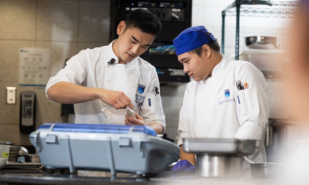 A group of chefs in a kitchen