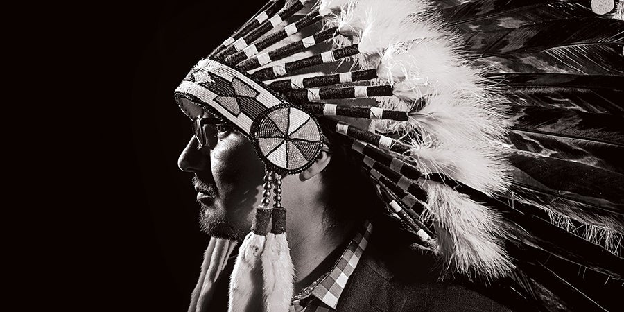 A man wearing a headdress