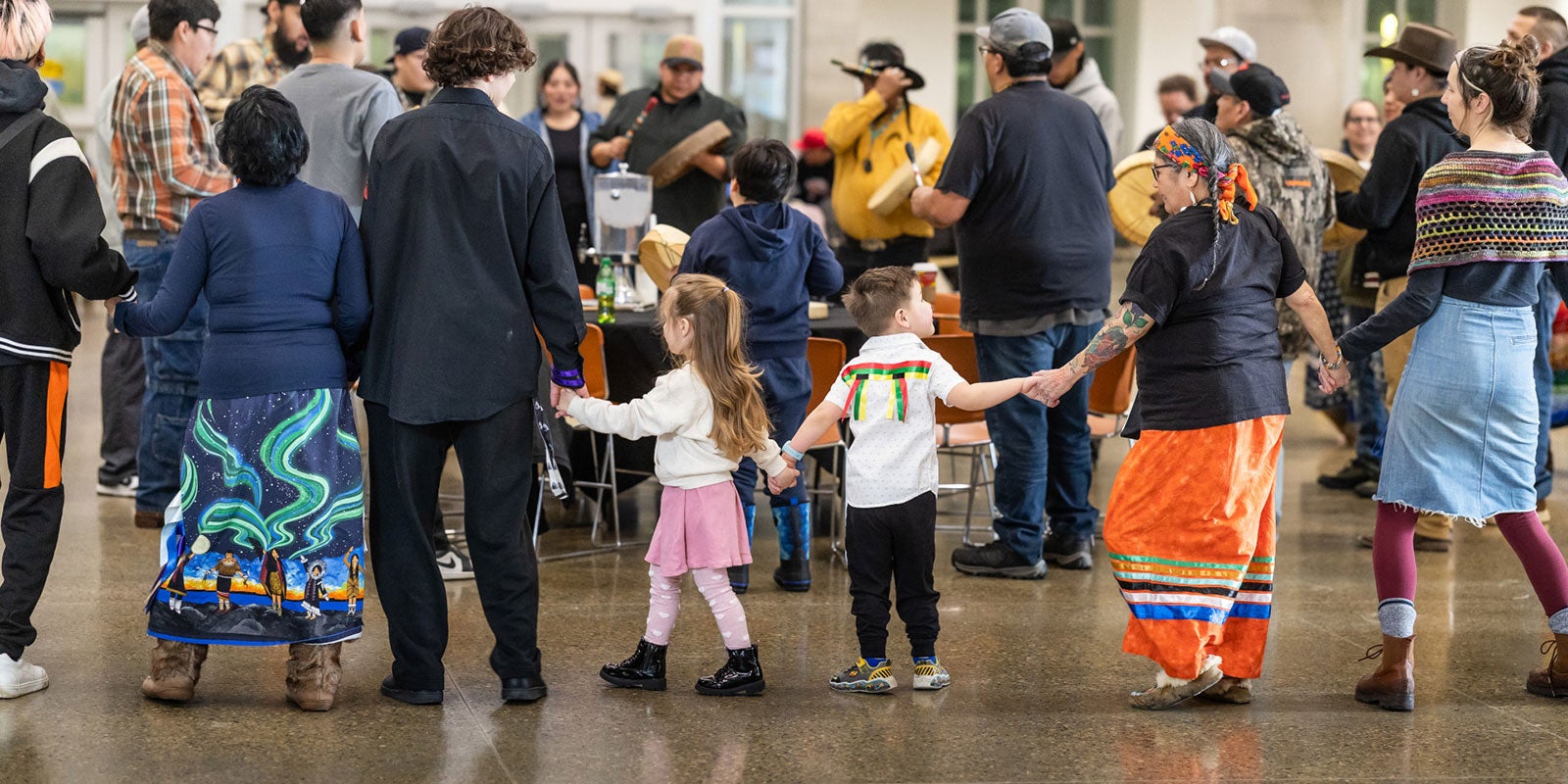 A group of people holding hands