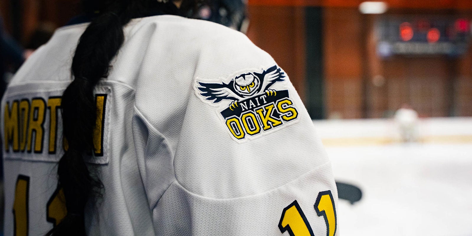 A person wearing a hockey jersey