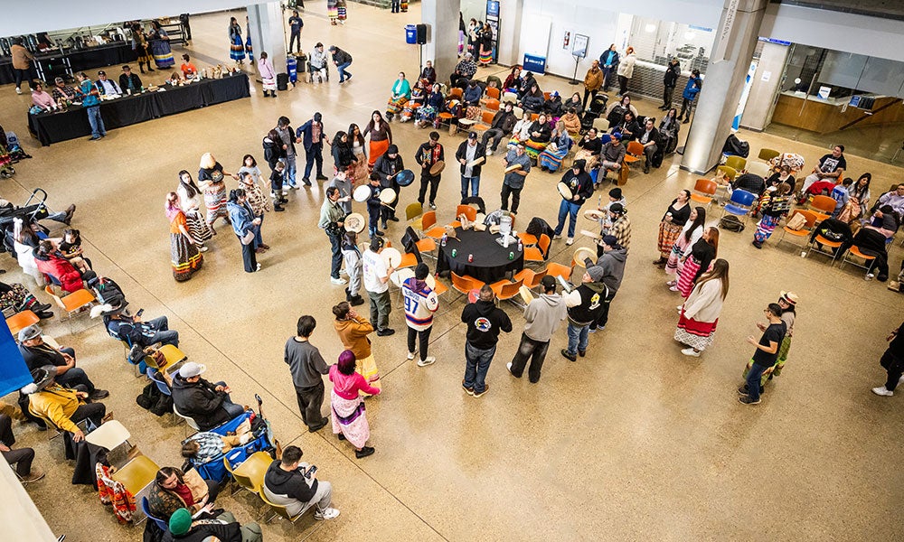 A group of people in a large room