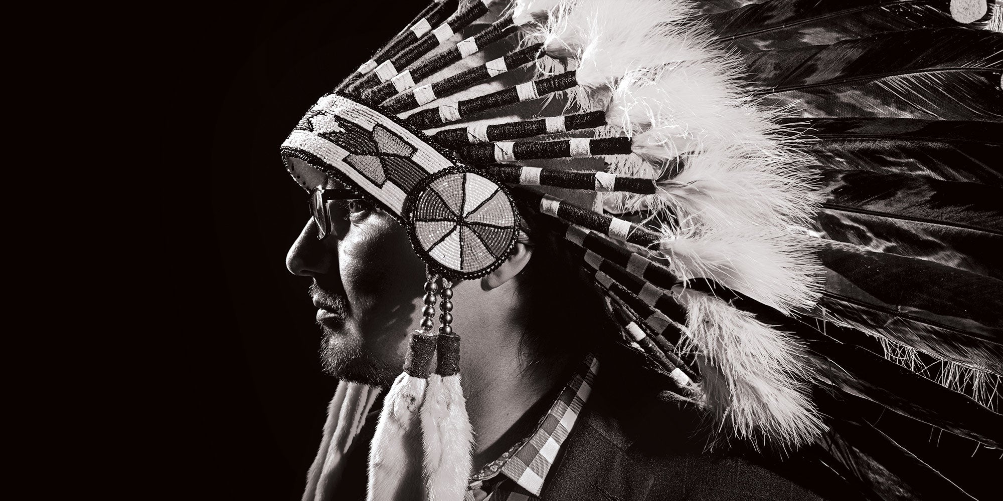 A man wearing a headdress