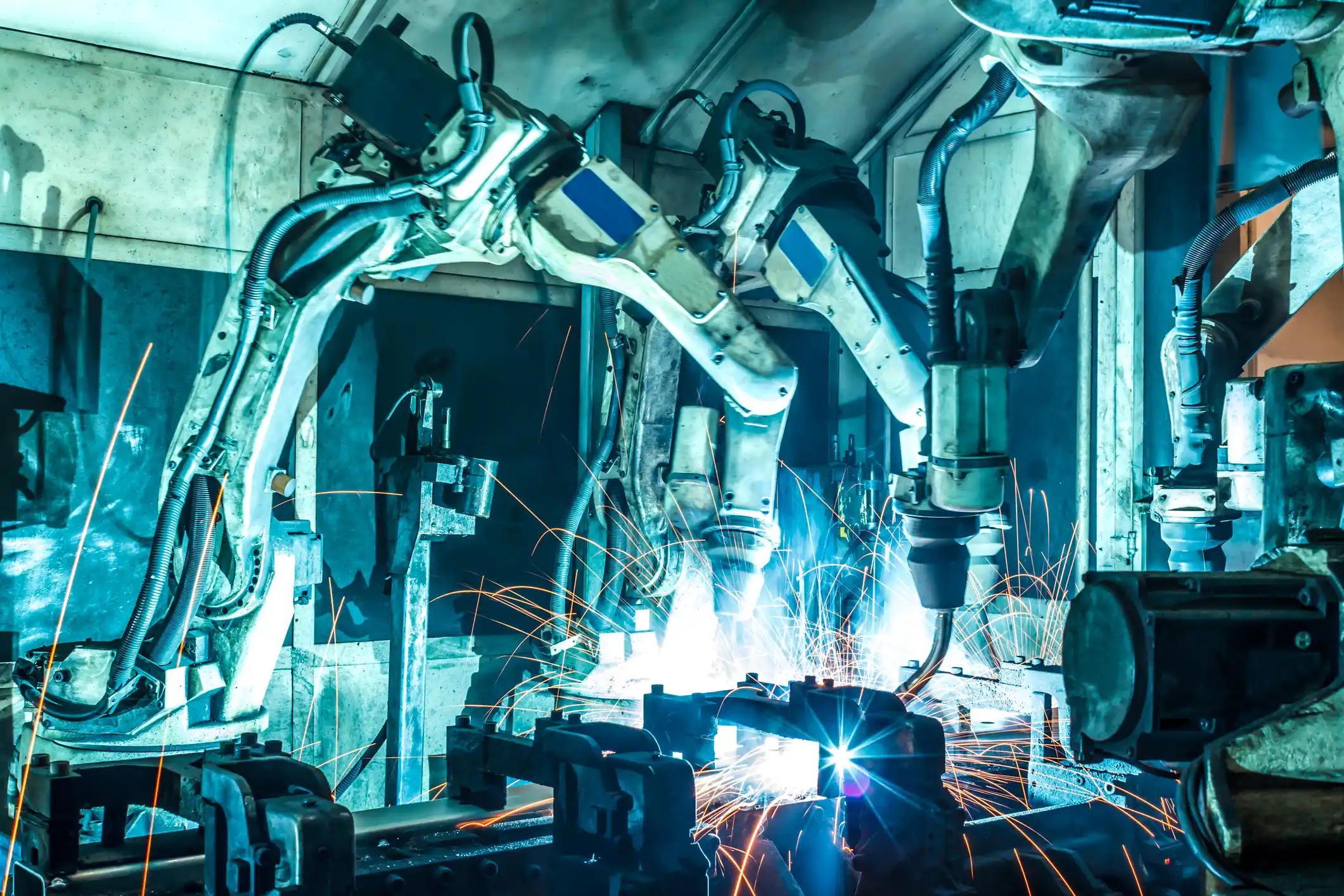 Robots welding in a car factory stock photo
