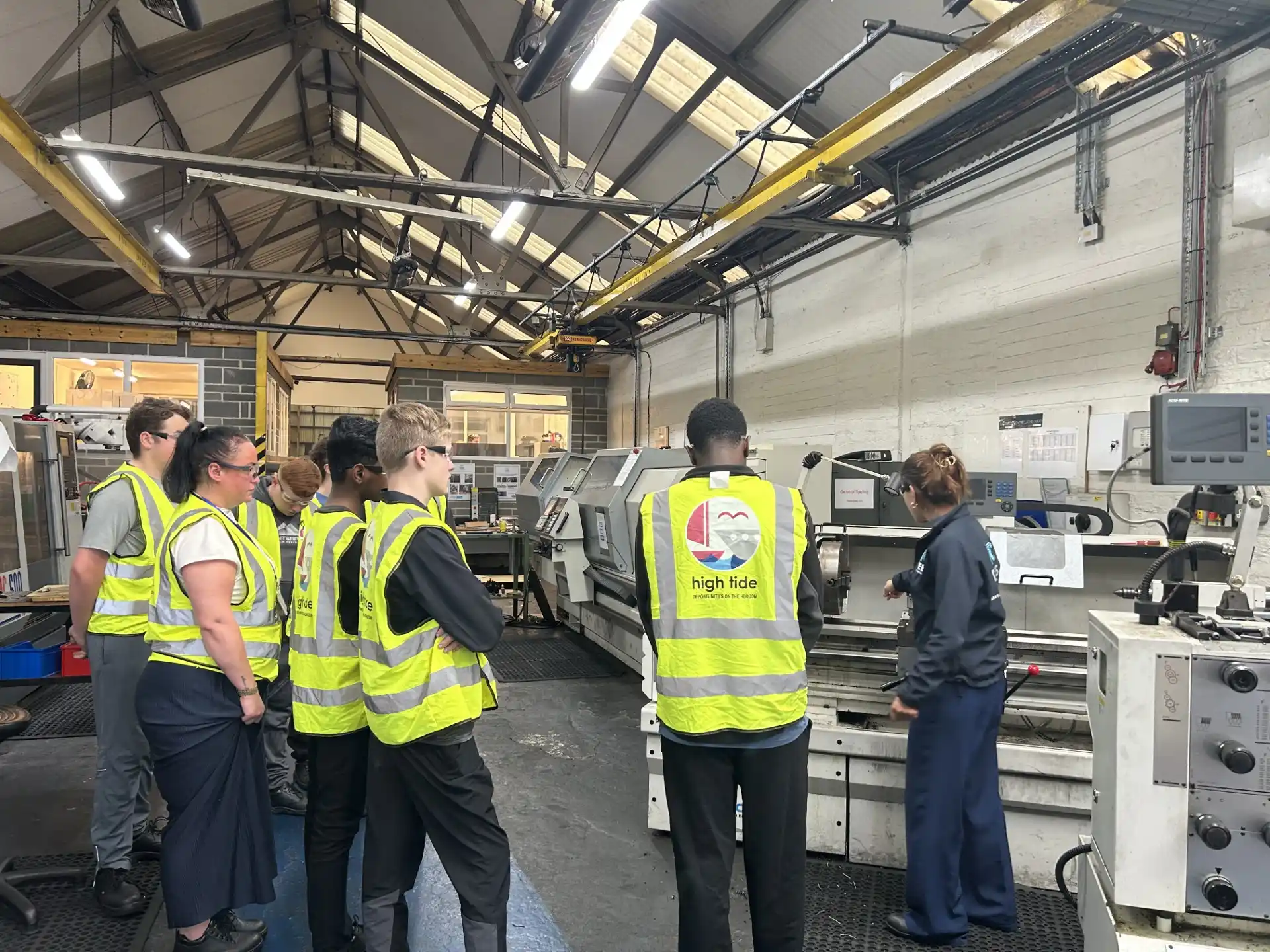 Picture of machine shop tour with year 11s from Middlesbrough, with High Tide Foundation