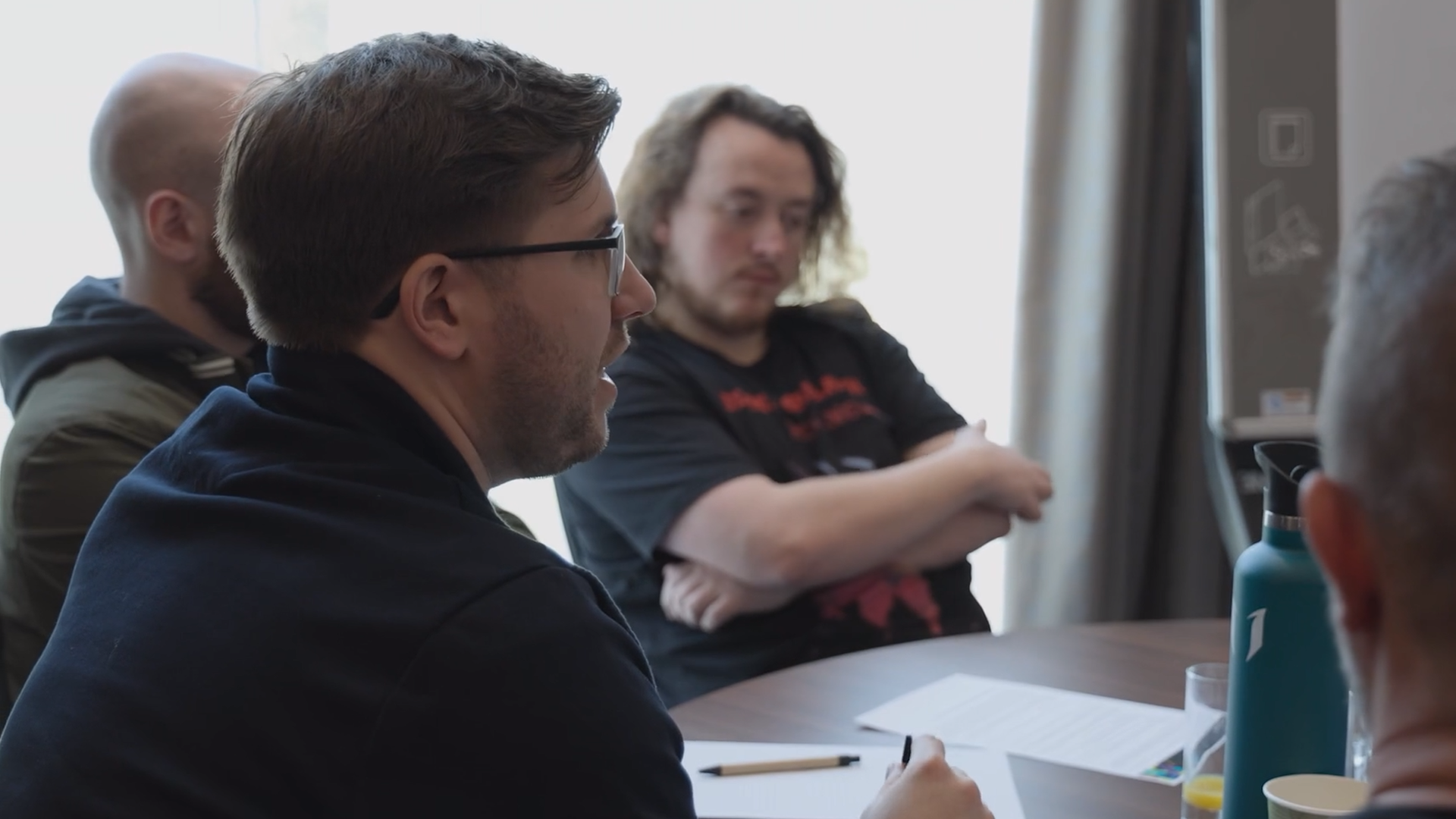 Lead to Succeed participants sitting at a table together