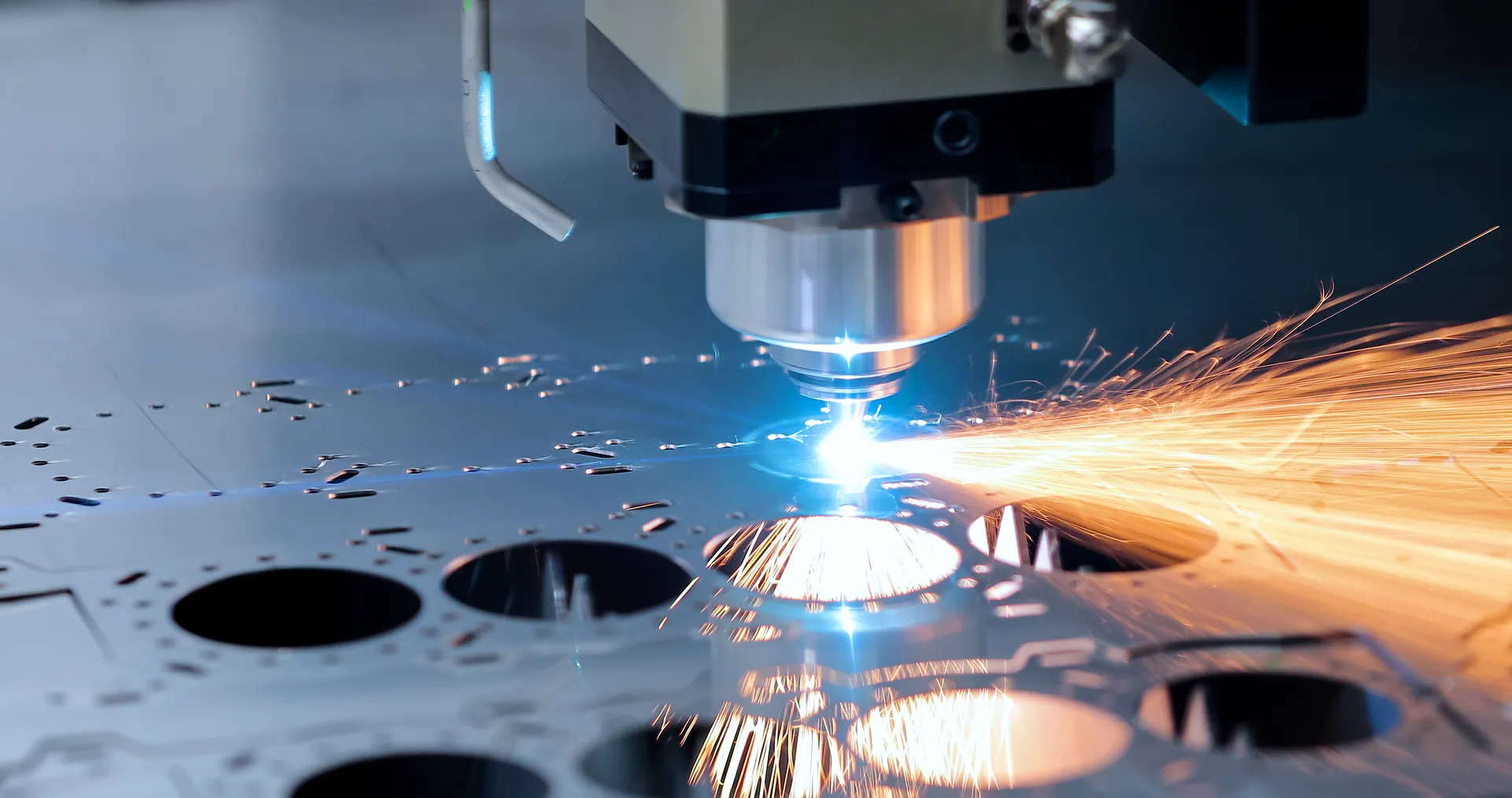 Processing and laser cutting for metal in the industrial. Motion blur. Industrial exhibition of machine tools.