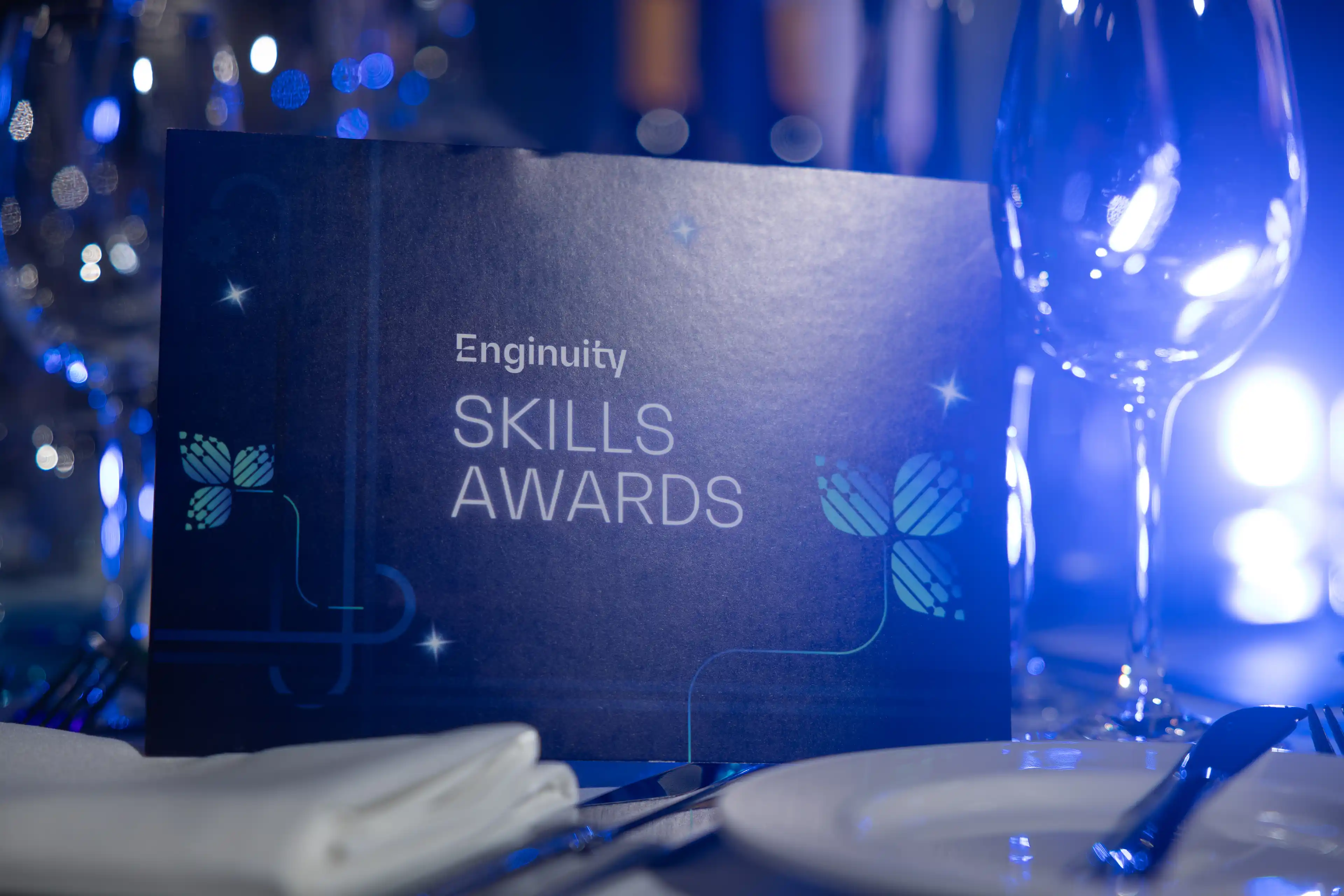 Skills Awards 2025 leaflet on an awards table.