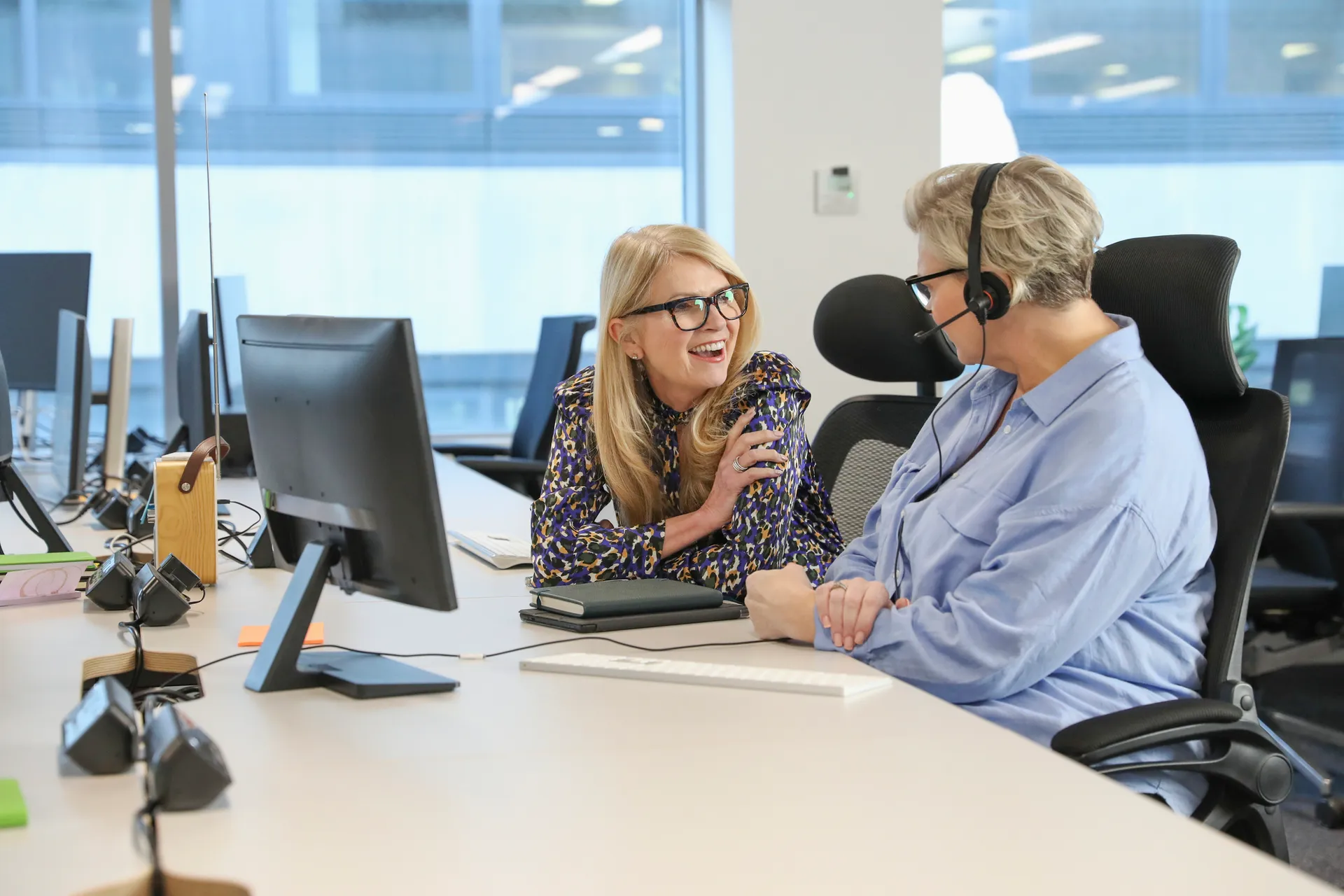 Businesswomen talking in office