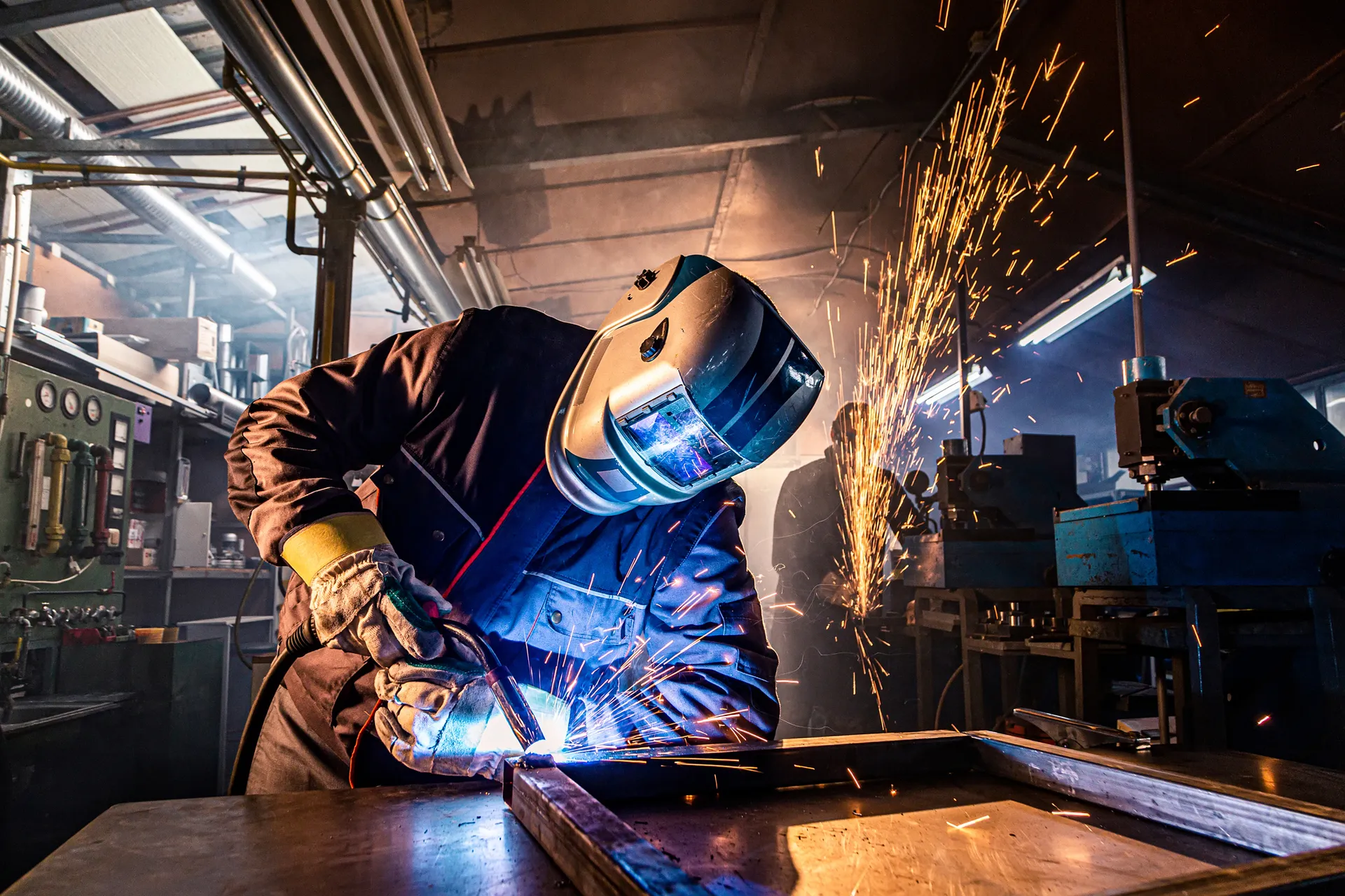 Welder in workshop