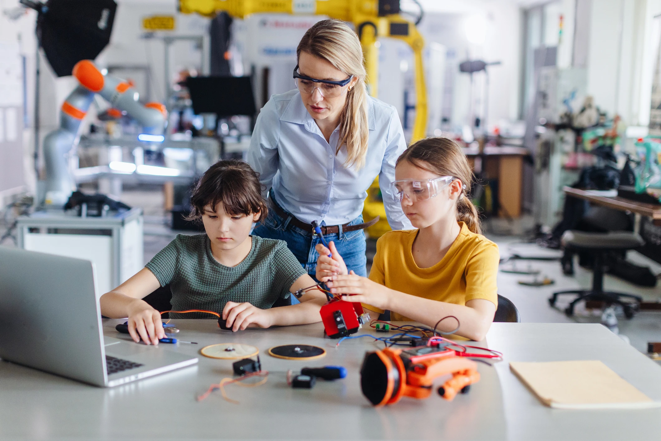 Two young female students in an engineering lab