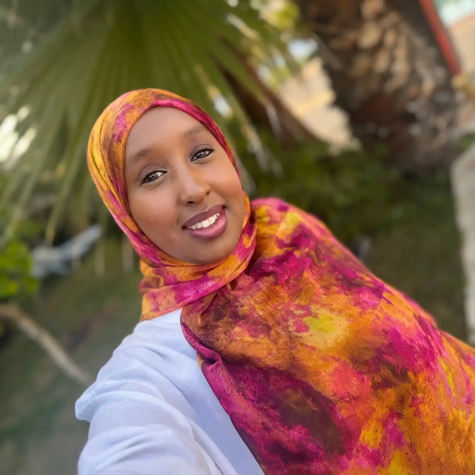 selfie of a female wearing a traditional head scarf