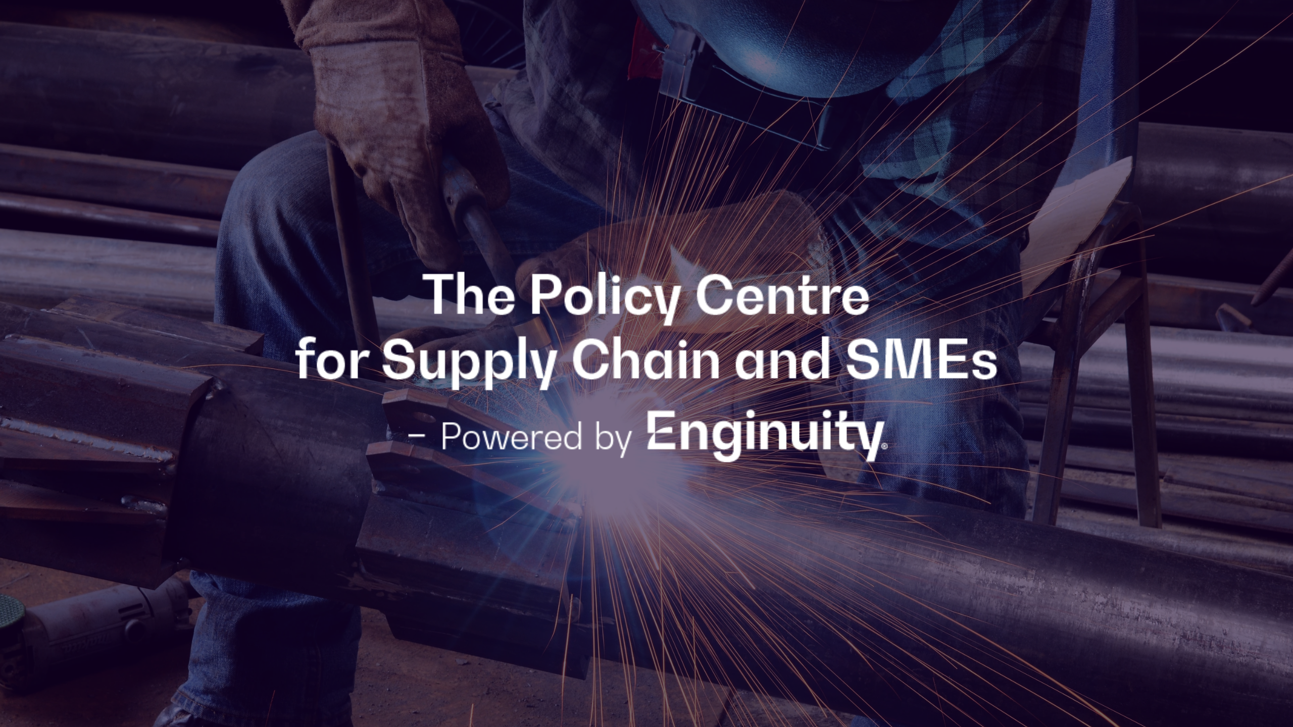 Welder welding stock image with Policy Centre logo