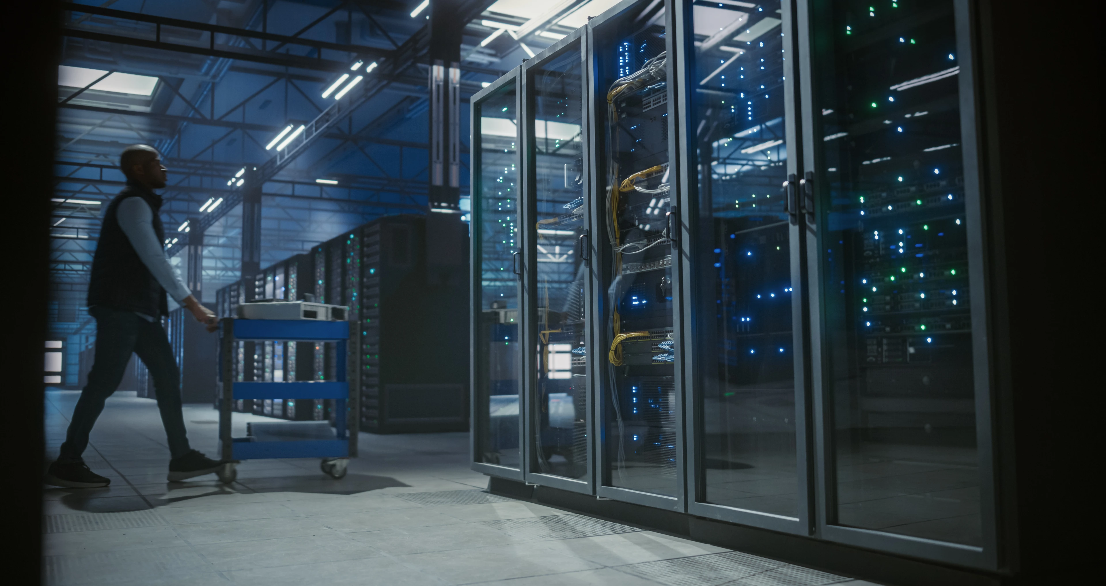 Technician walks through the server room