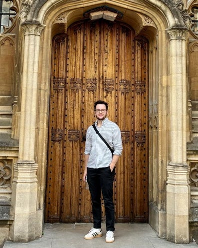 Jules standing in front of a cathedral