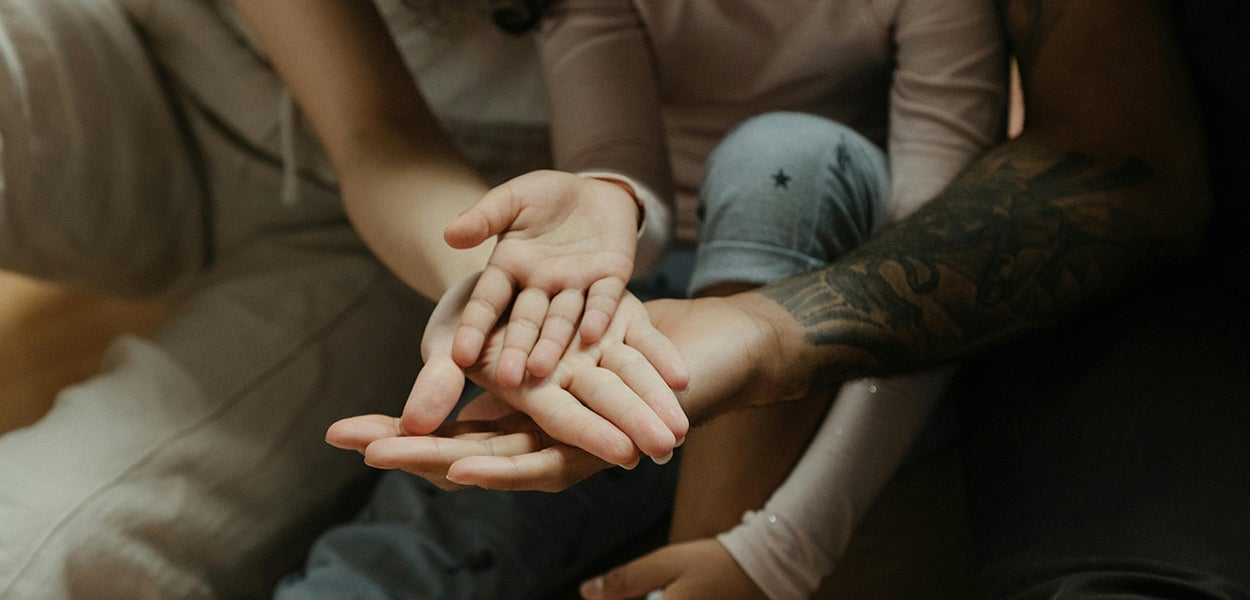 A group of people holding hands