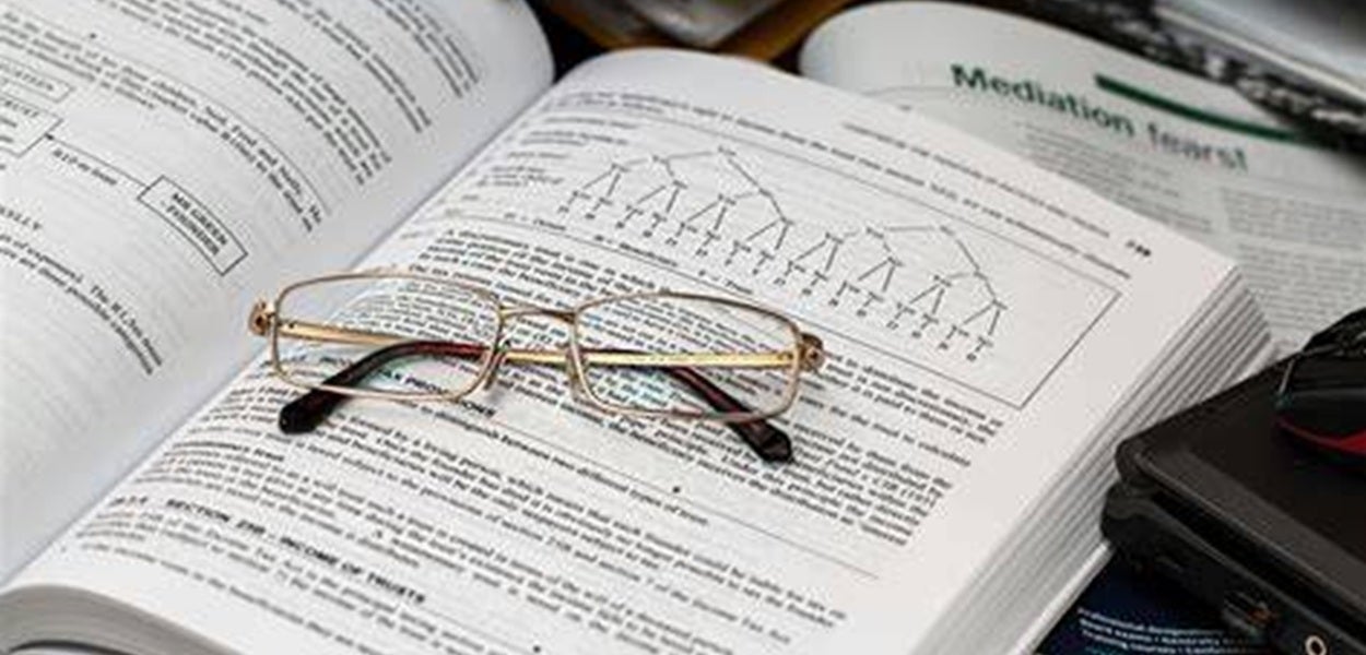 Glasses on an open book