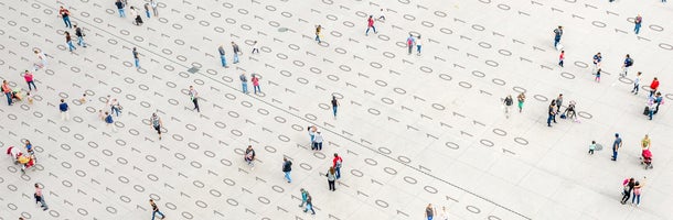 People standing on digital code