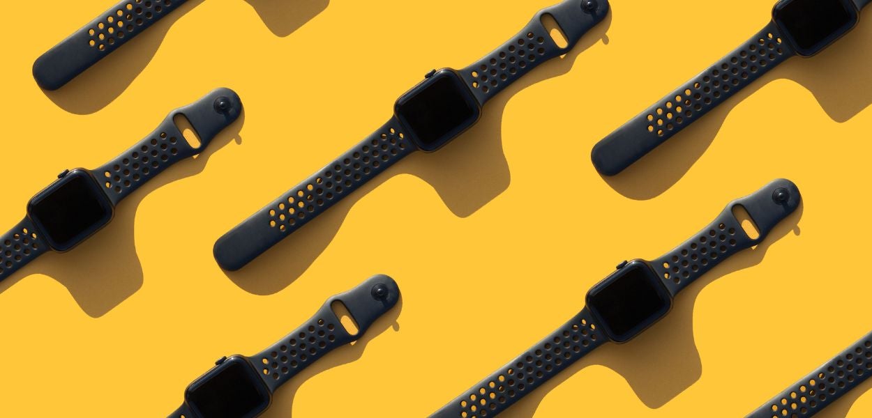Electronic Watches on a Yellow Background