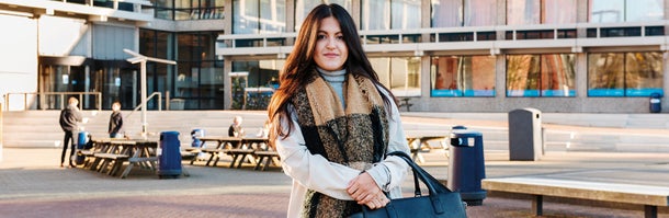 Student girl standing on the VU Campus square 