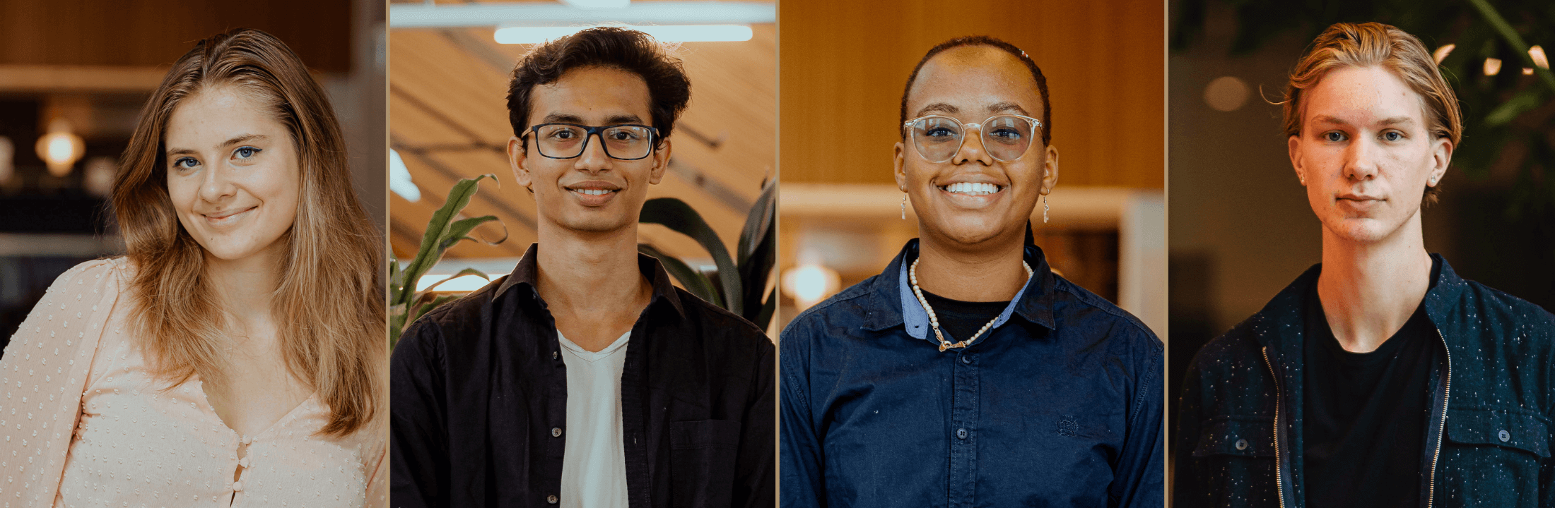 Four students look into the camera