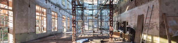  Building under construction with scaffolding