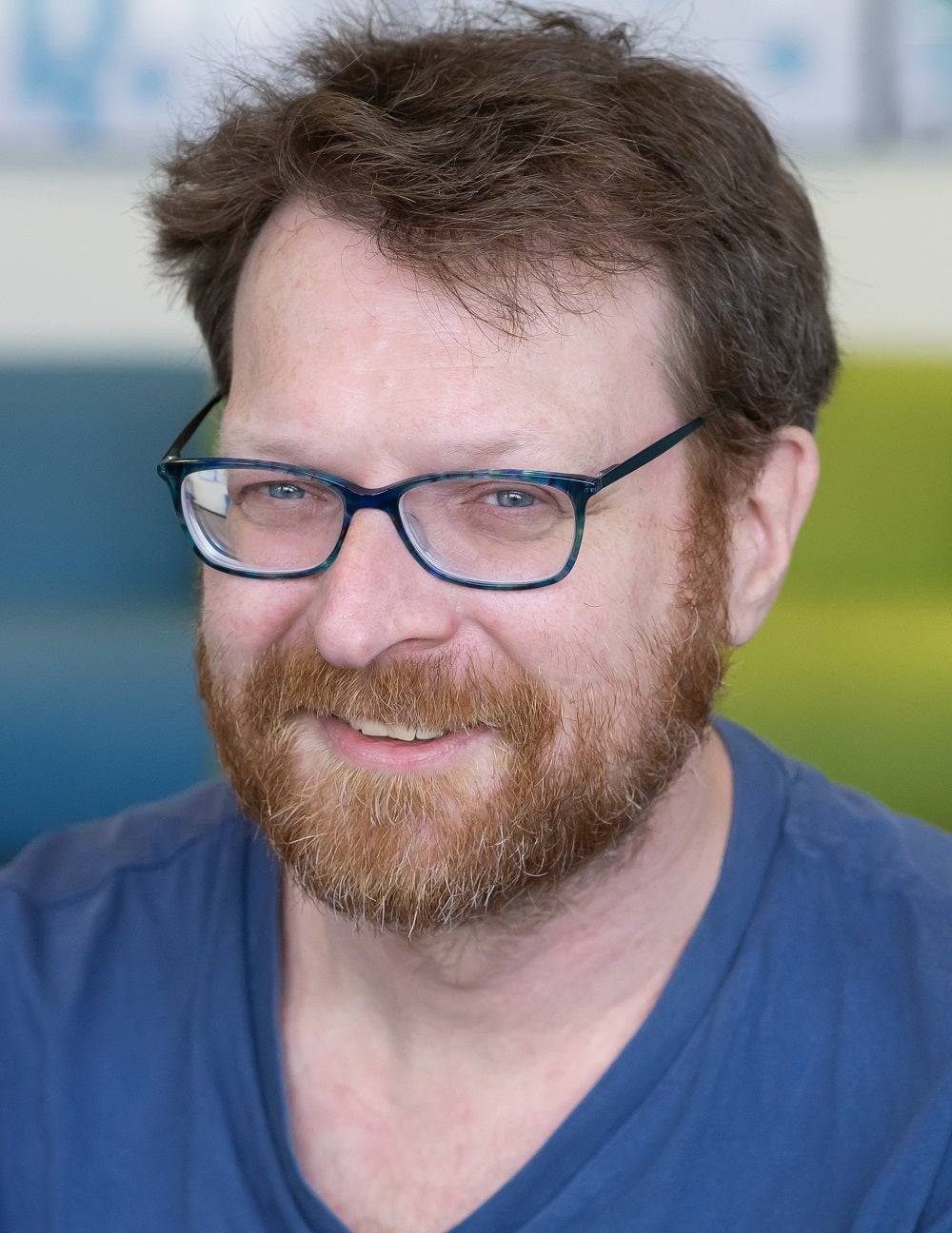 This is a picture of Tim Veken. He is team member of Digital Services and Infrastructure.