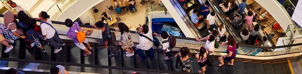  Several escalators with people