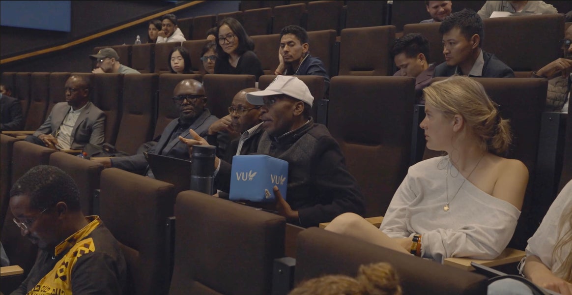 People talking in lecture hall