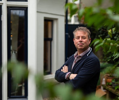 A man with his arms folded