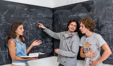 Students working together on an assignment