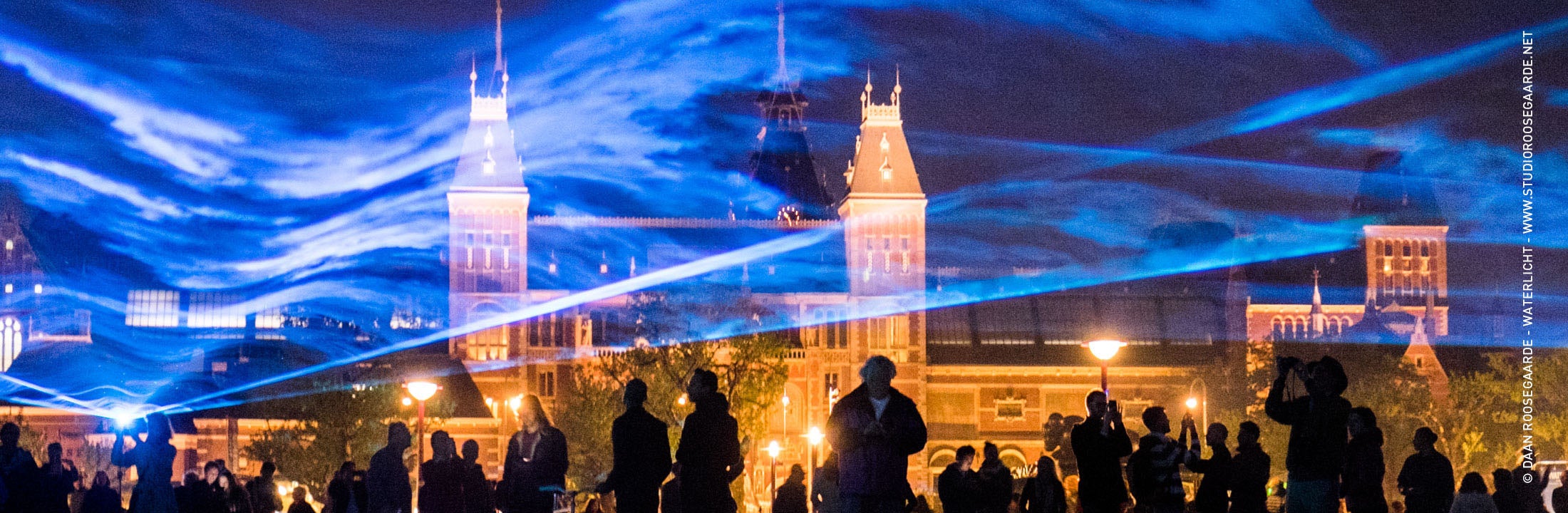 Rijksmuseum Amsterdam with blue light during the Light Festival, installation by artist Daan Roosegaarde