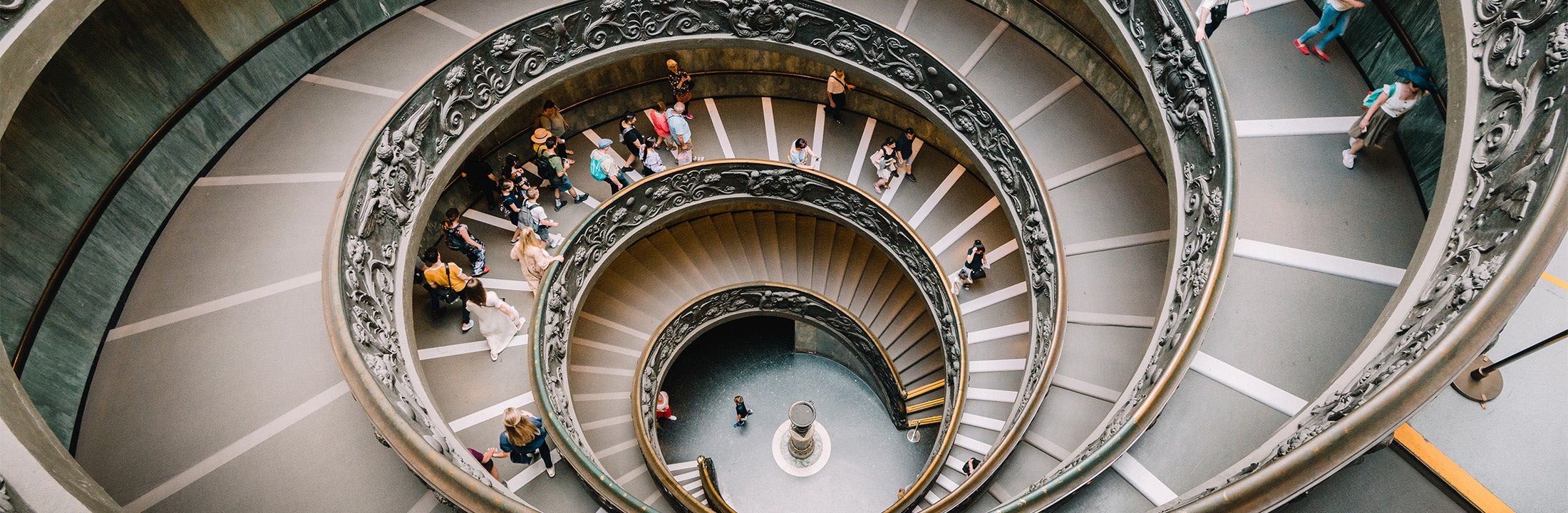 A big spiral staircase in a building