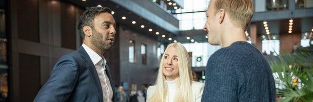 Three people talking